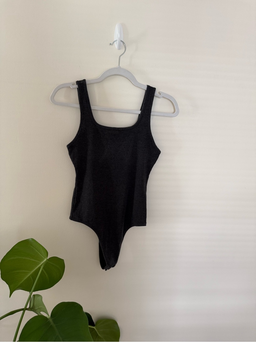 Black Ribbed One-Piece Bodysuit